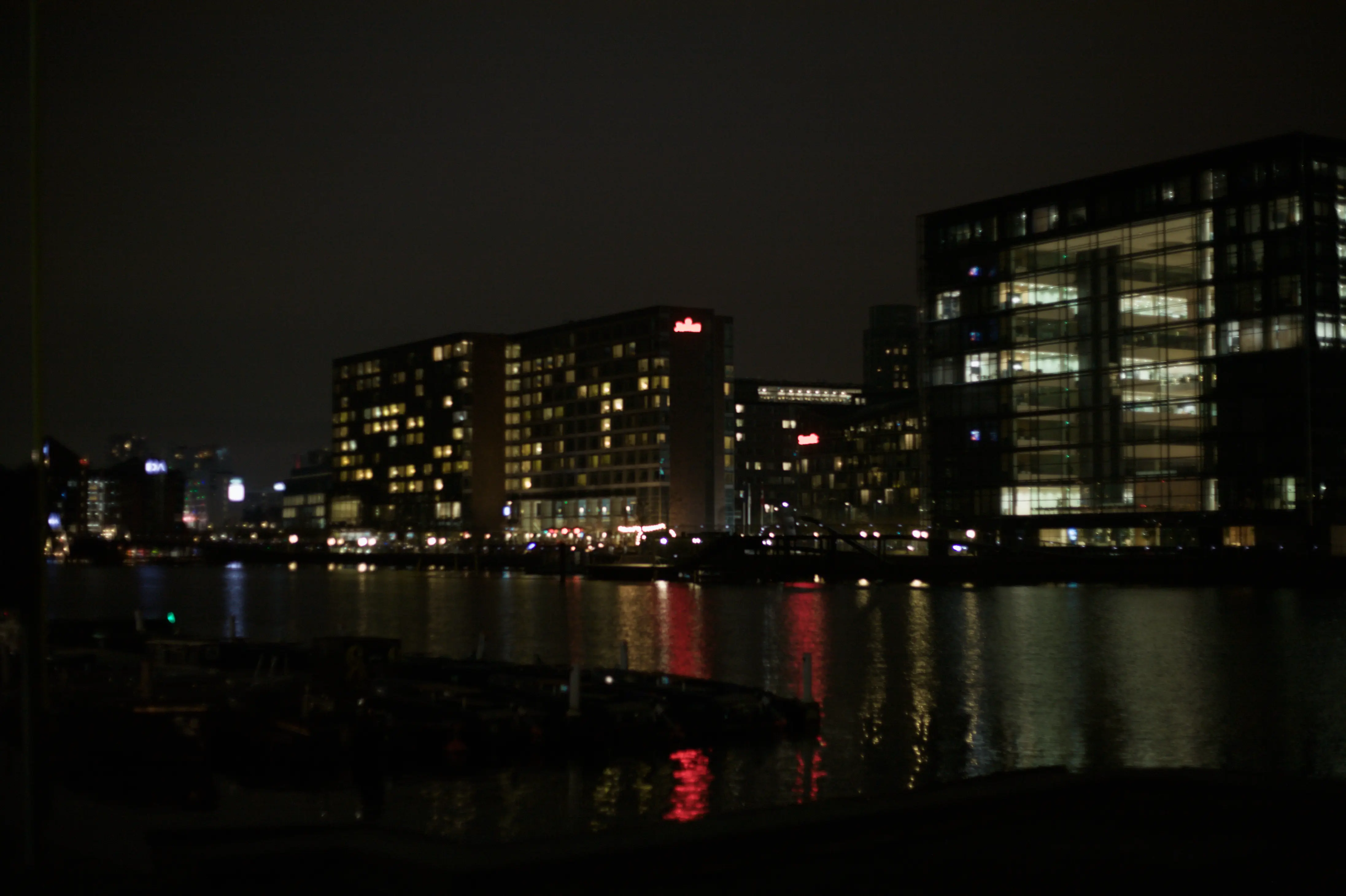 The waterfront of the Indre By at night.