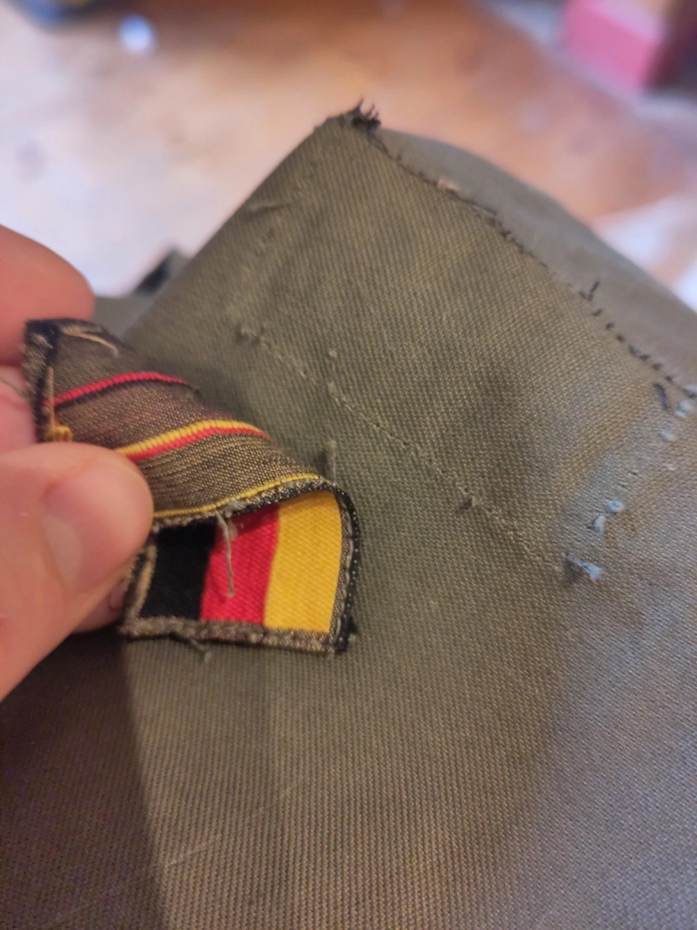 The German flag being removed.