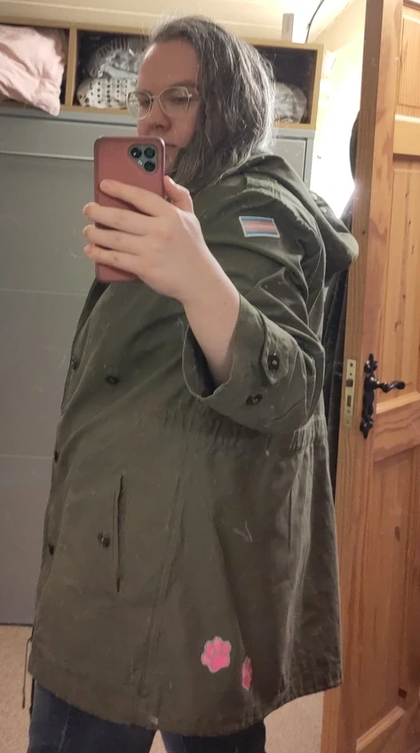 Me modelling the finished coat, also showing some pink pawprint patches applied to bottom of the coat at the back.