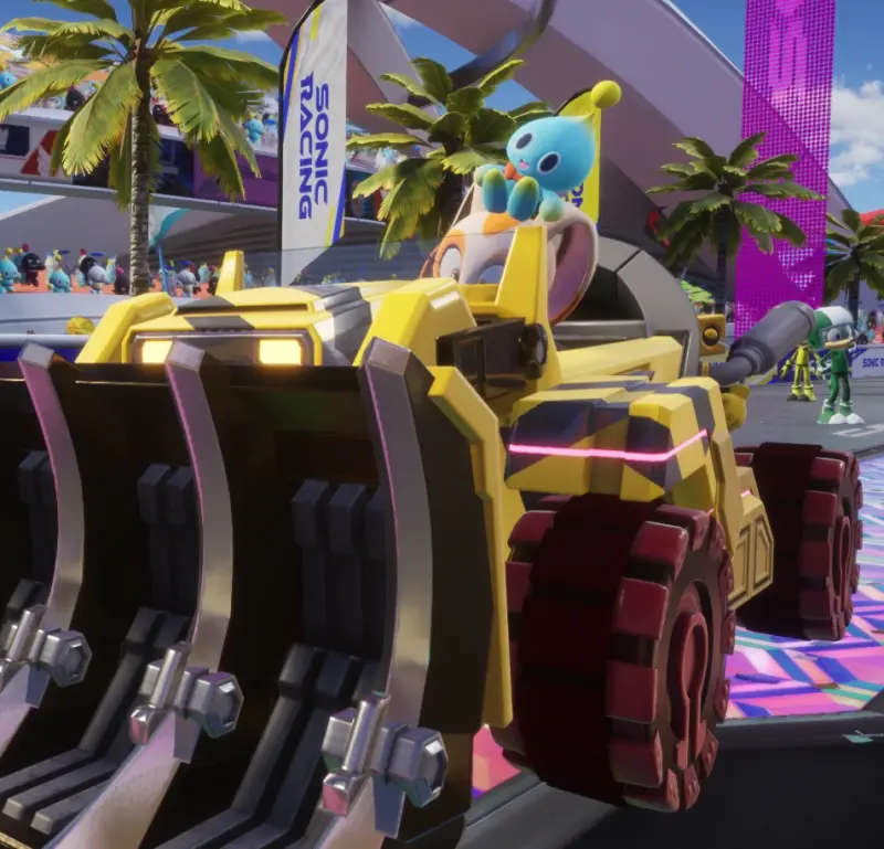 Cream in a big bulldozer that doesn’t even fit on screen fully. It’s bright yellow with black hazard stripes.